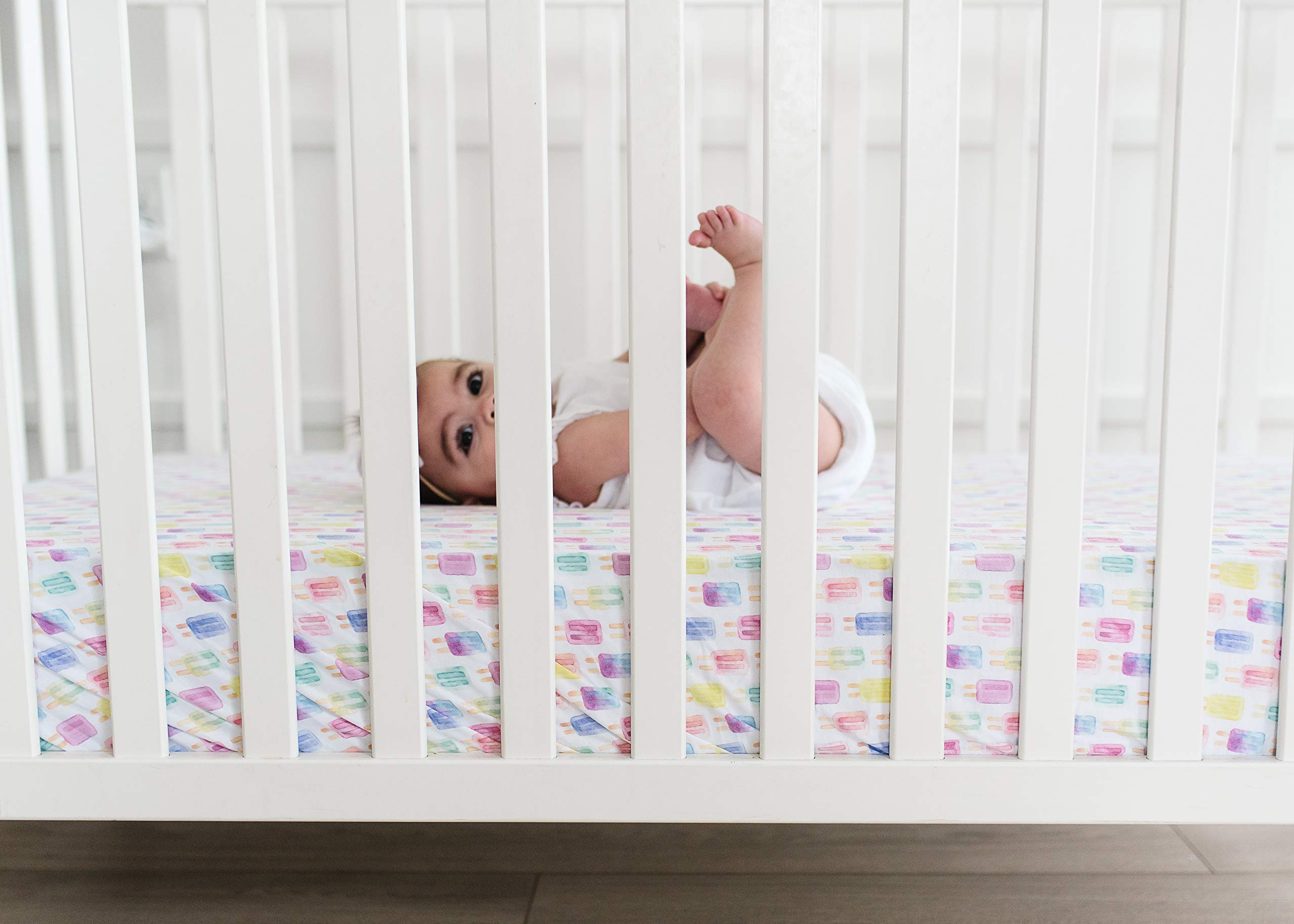 Copper Pearl knit crib sheet enhances nursery style with simple, modern design