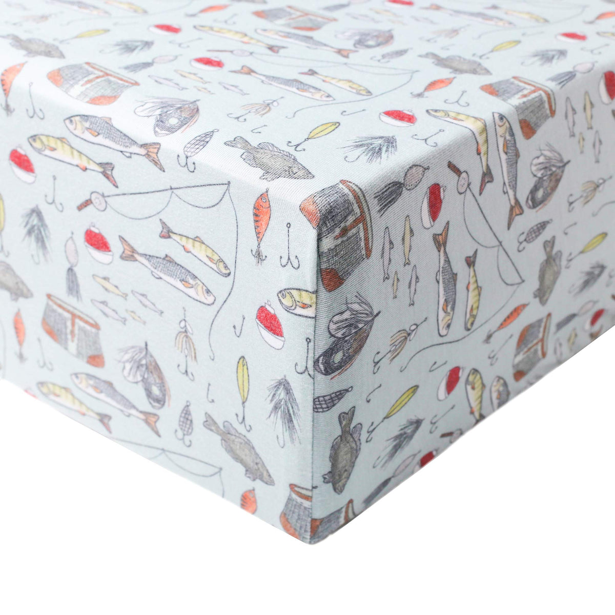 Copper Pearl Trout knit crib sheet on a standard mattress for cozy nights