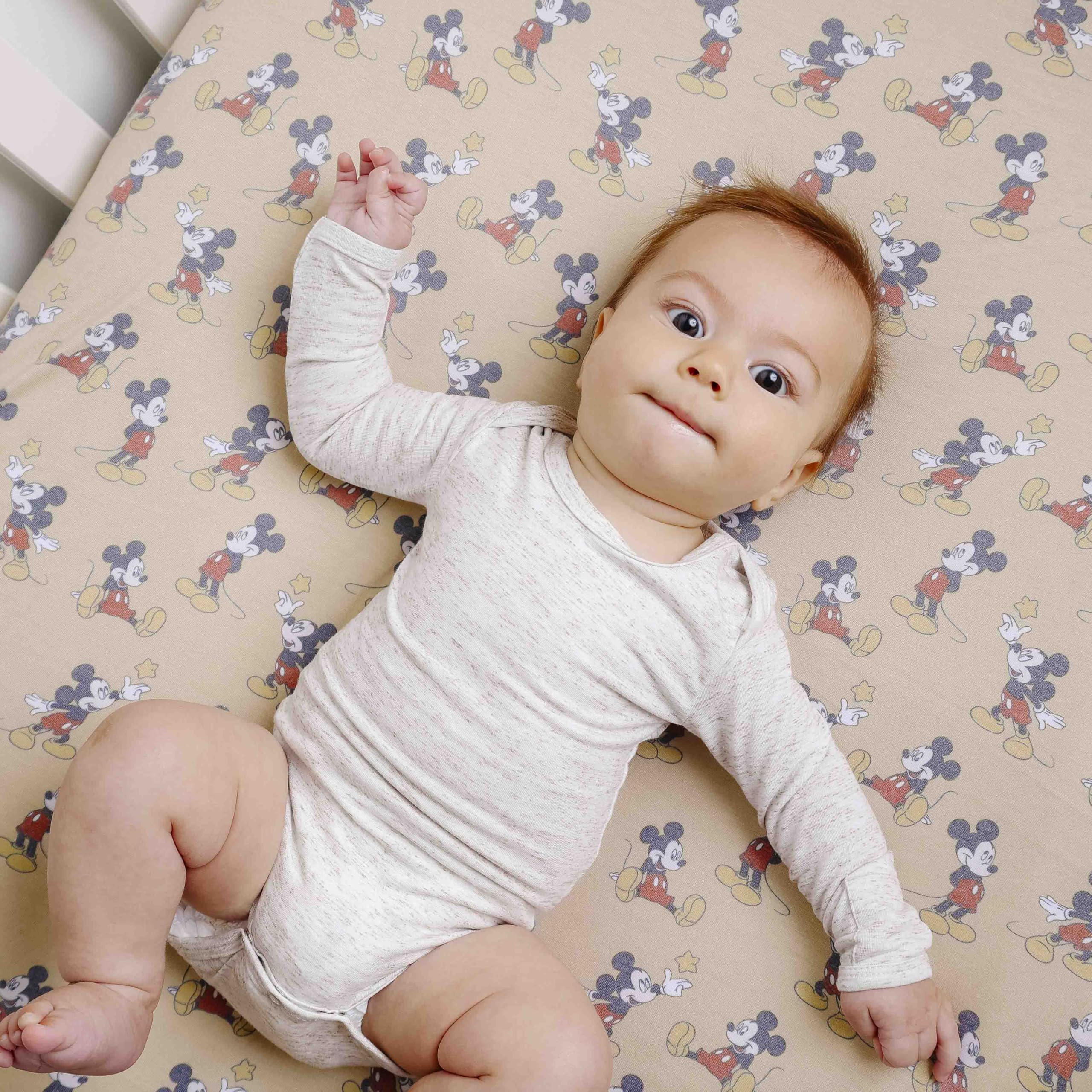 Copper Pearl premium knit crib sheet highlighting breathable fabric and easy care