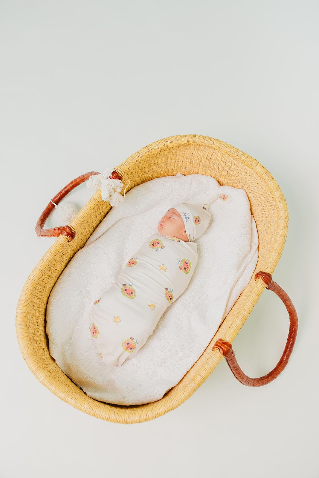 Copper Pearl premium-knit fabric blanket for soft, gentle baby cuddles.