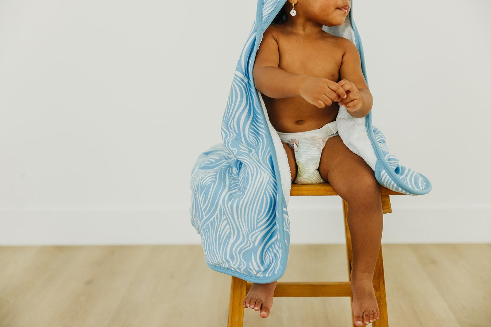 Copper Pearl Surf kid-size 50x29.5 towel provides roomy coverage for toddlers.