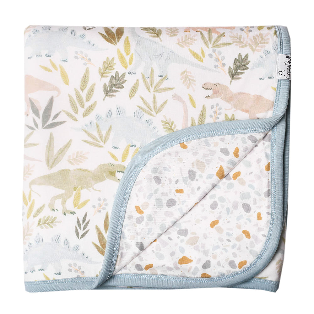 Copper Pearl Rex three-layer quilt soft-knit fabric offers gentle warmth for baby.