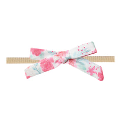 Copper Pearl Ribbon Baby Bow June closeup showing ultra-soft fabric and premium finish.