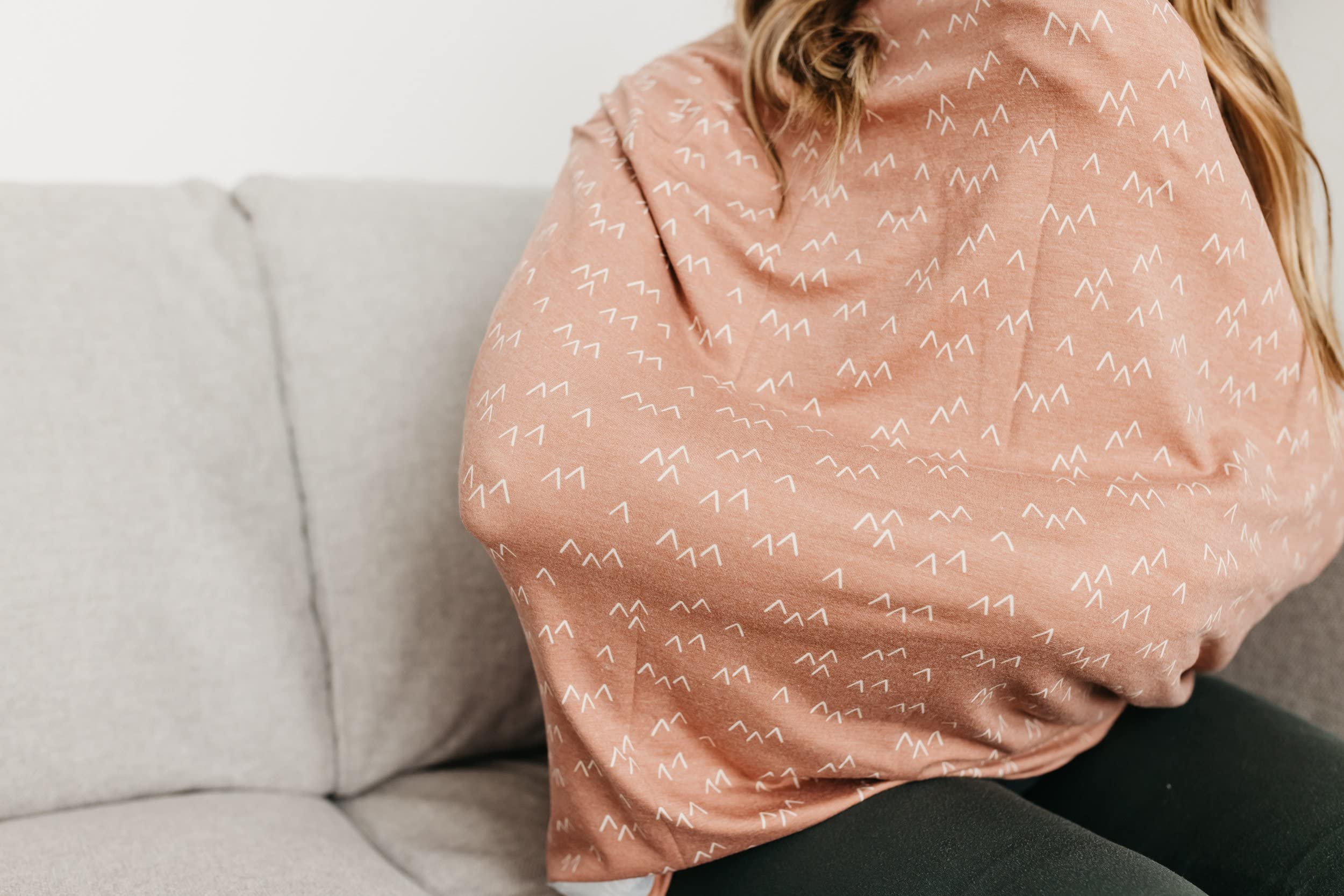 Copper Pearl Rocky shopping cart cover protects baby during errands.