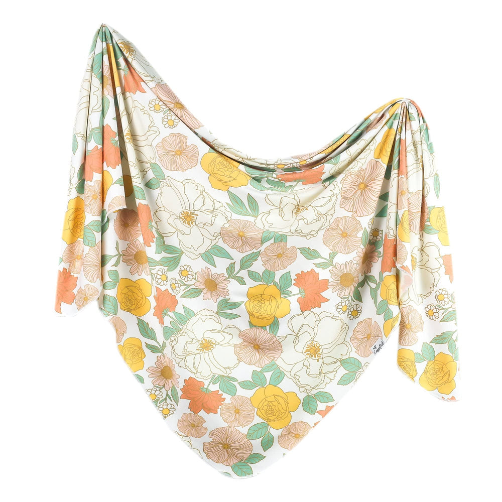 Copper Pearl Rose swaddle blanket: soft, breathable comfort for baby from newborn to toddler.