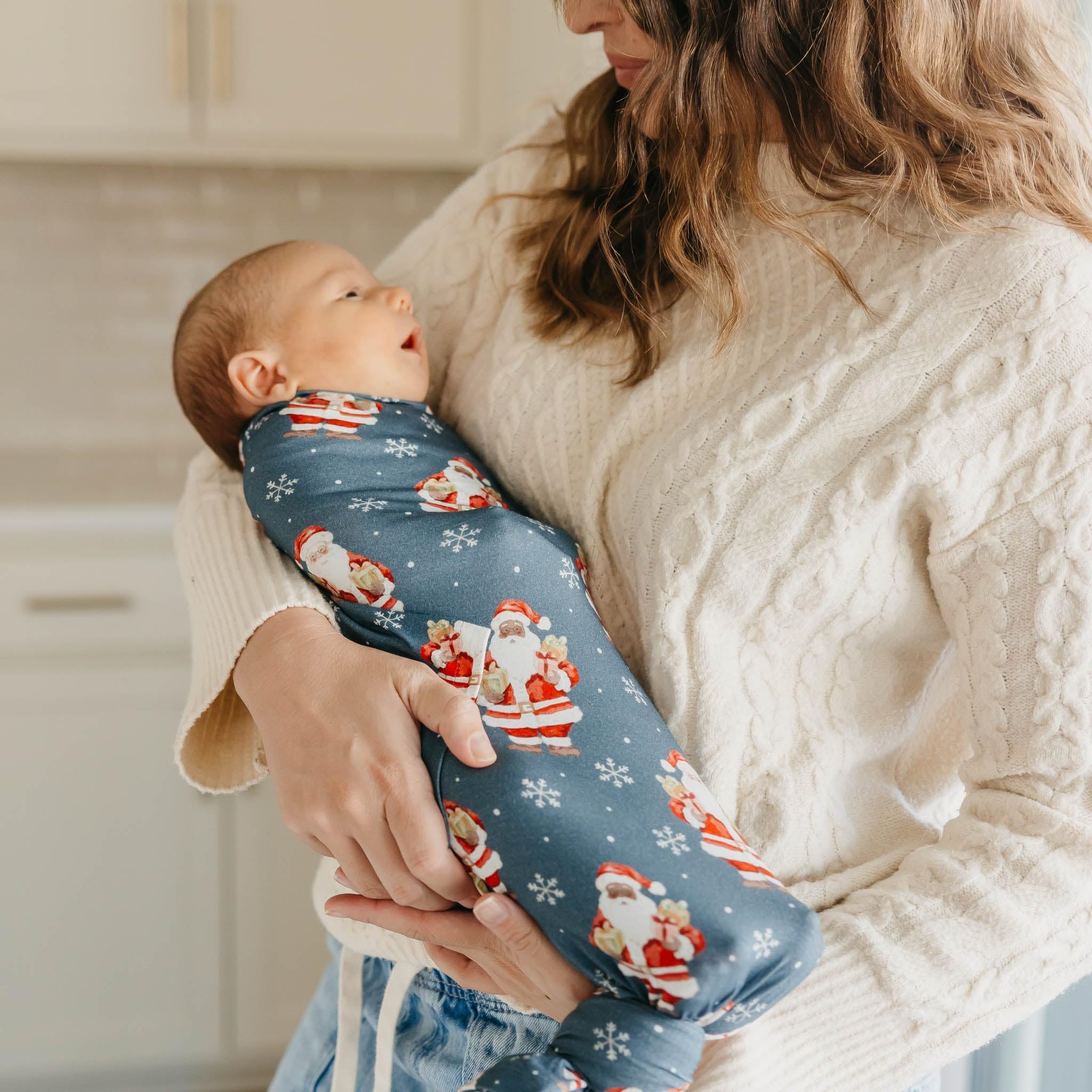 Gift-ready Copper Pearl Santa Claus swaddle packaging, ideal for new mom gifts
