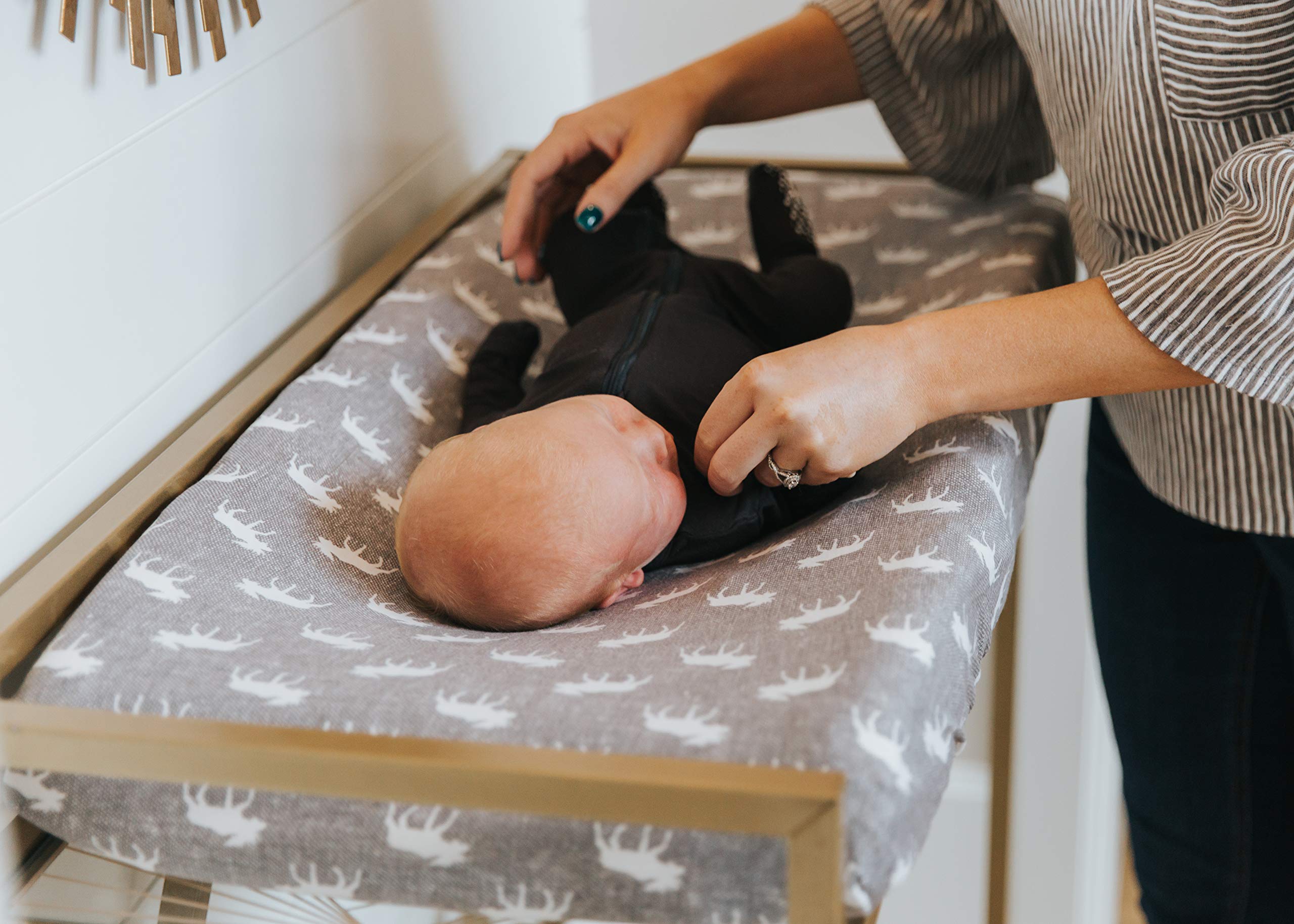 Copper Pearl Scout breathable knit fabric promotes comfort during diaper changes.