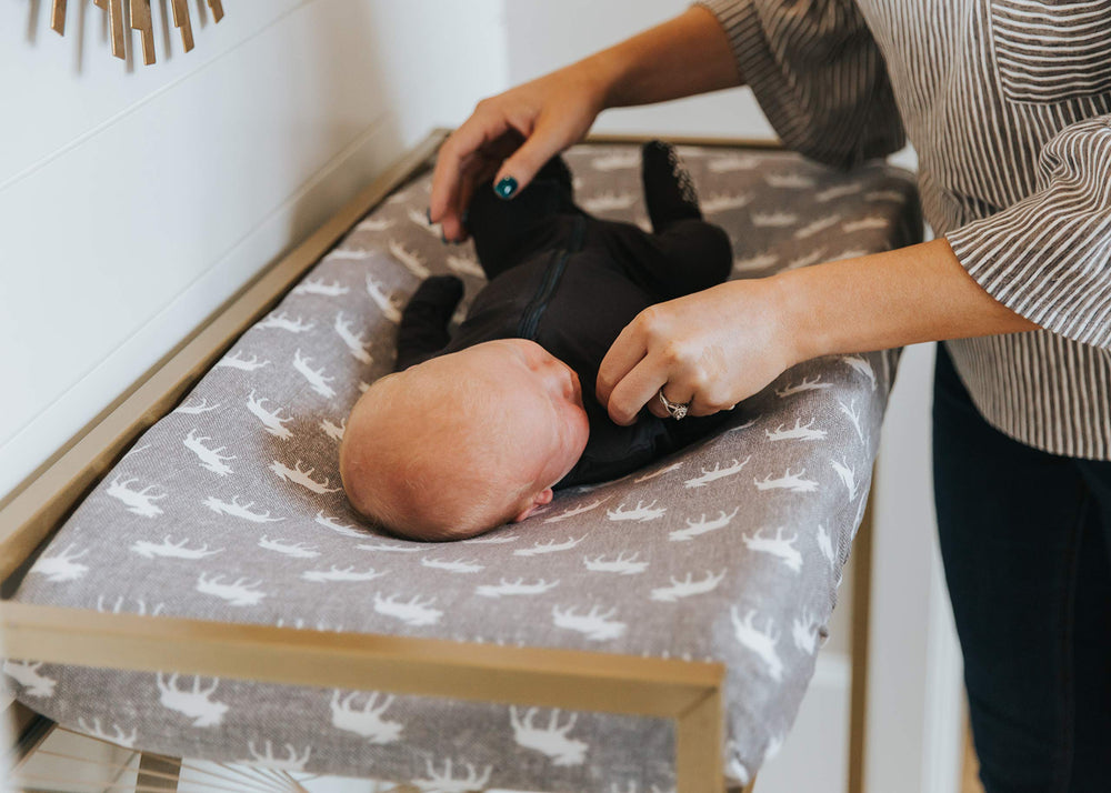 Copper Pearl Scout breathable knit fabric promotes comfort during diaper changes.