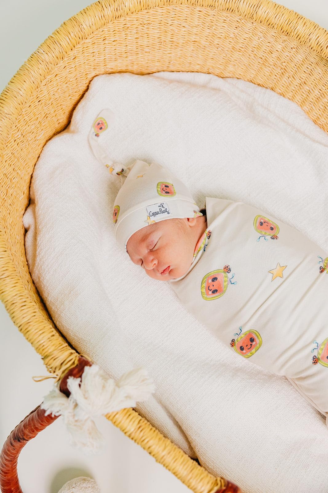 Serged edges on Copper Pearl swaddle ensure durable, long-lasting use.