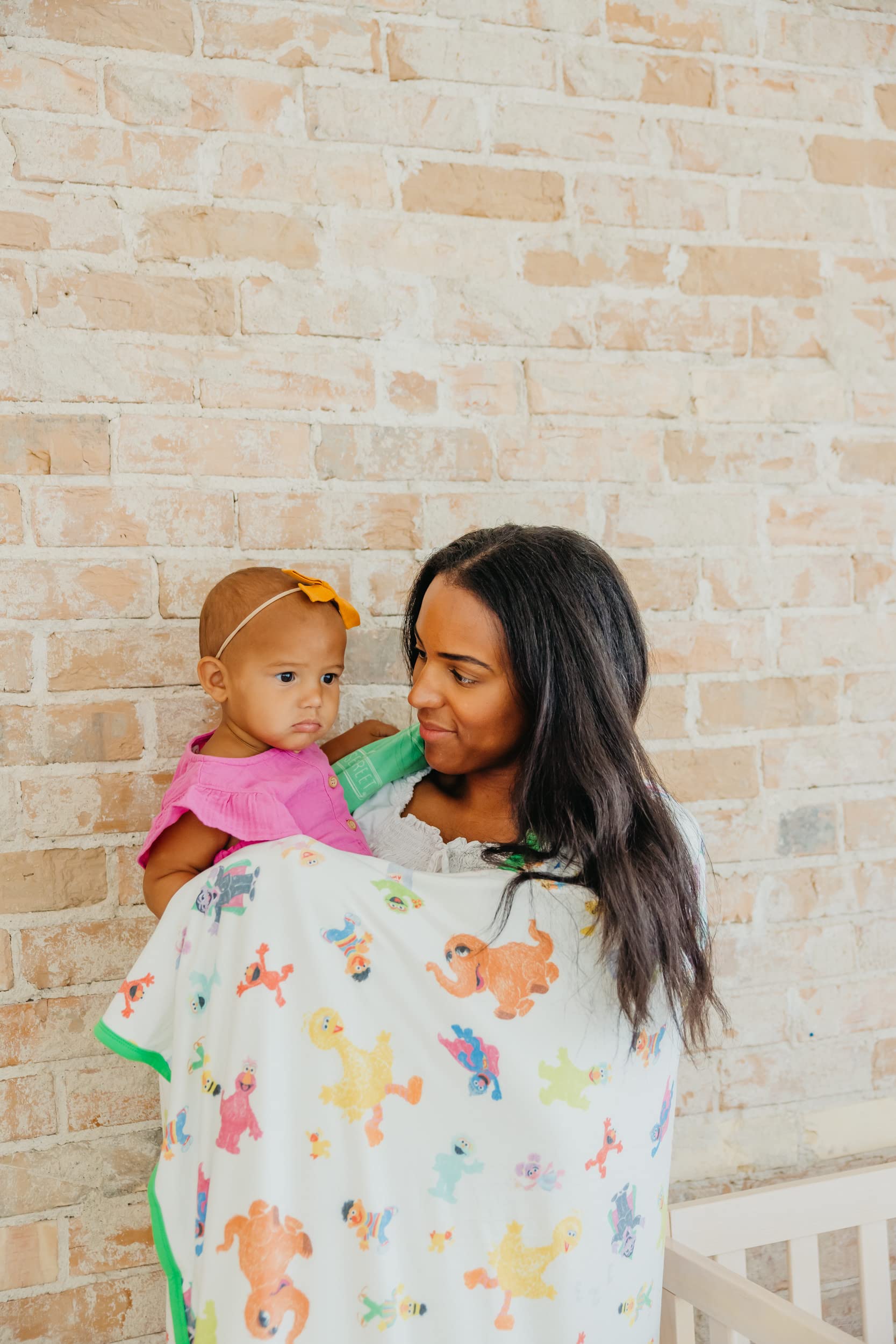 Copper Pearl Sesame Friends blanket in stroller for on-the-go comfort.