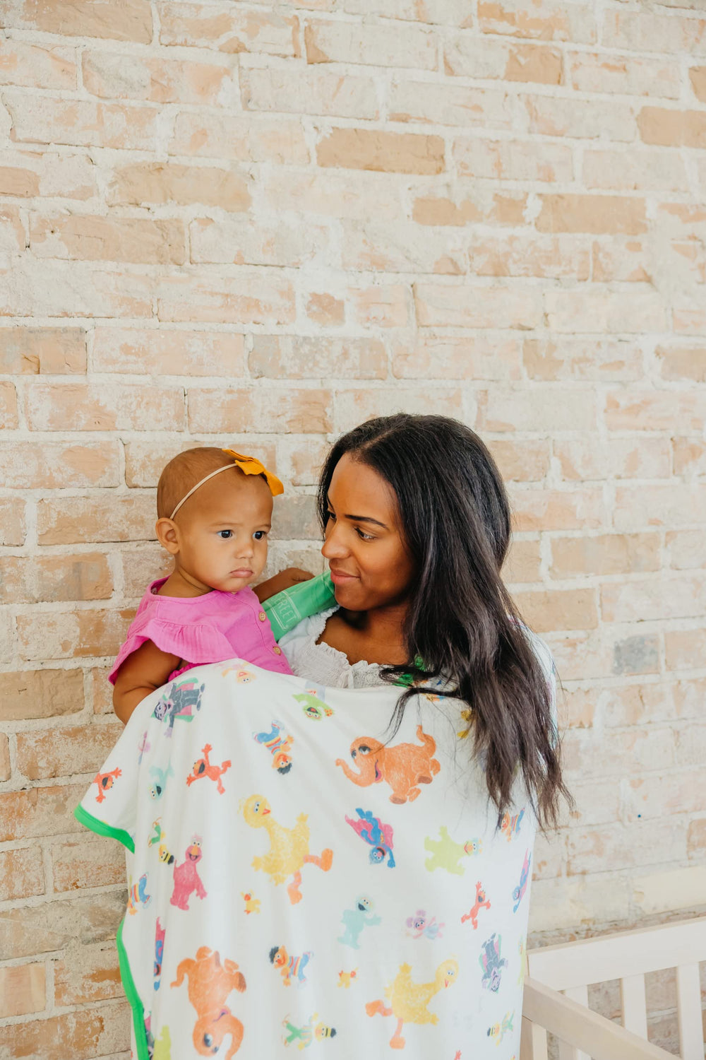 Copper Pearl Sesame Friends blanket in stroller for on-the-go comfort.
