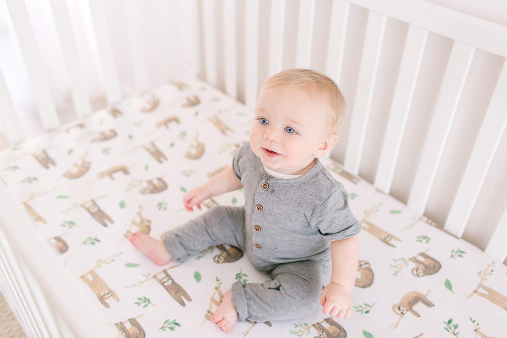 Copper Pearl shower gift crib sheet close-up conveys thoughtful registry staple