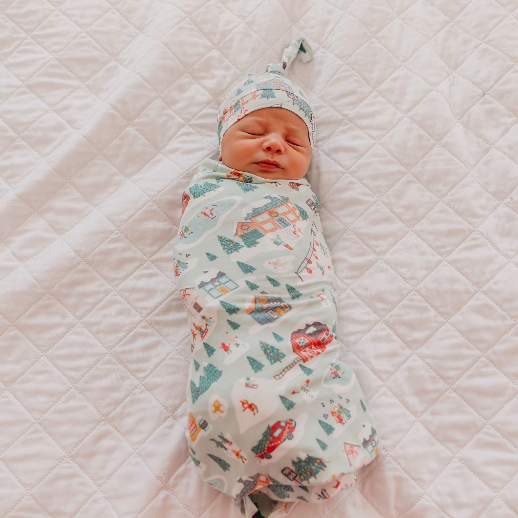 Copper Pearl Snowy Slopes knit blanket in a nursery scene for cozy decor and warmth.