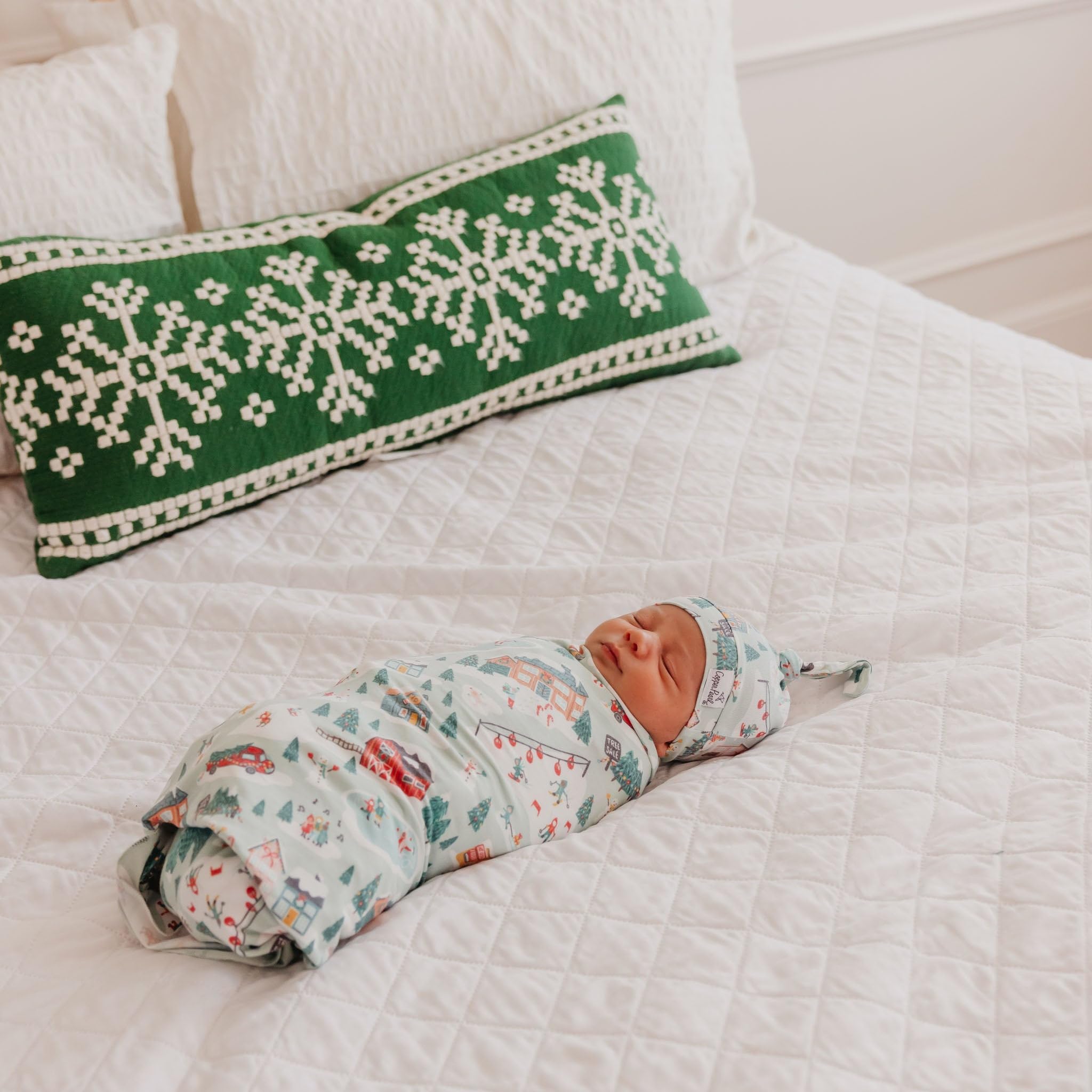 Copper Pearl Snowy Slopes knit blanket on a stroller for on-the-go comfort.