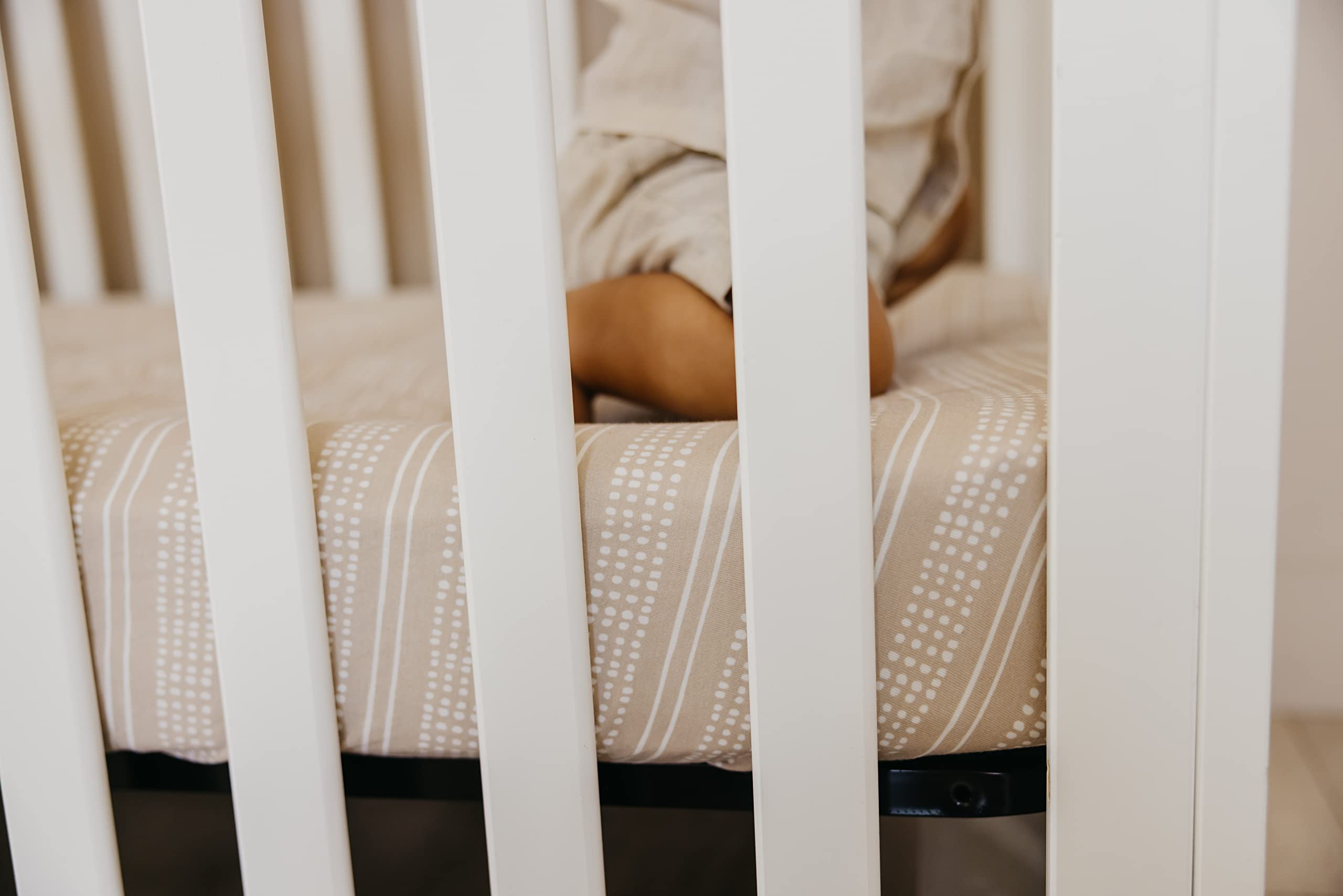 Copper Pearl standard mattress-fit crib sheet; snug fit on most standard mattresses.