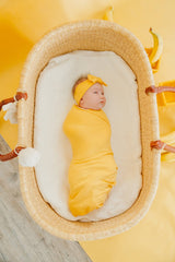 Copper Pearl Banana Swaddle Blanket features a stylish print to pair with outfits.