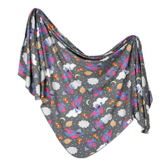 Copper Pearl swaddle blanket flat lay shows soft, breathable fabric and stylish print.