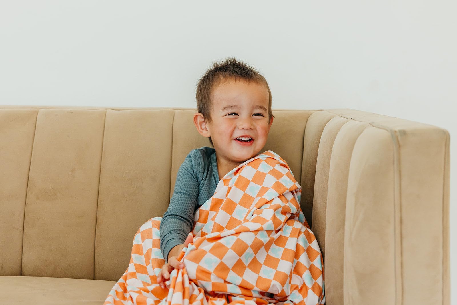 Copper Pearl swaddle edges serged for durability and long-lasting use