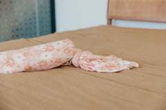 Copper Pearl swaddle nursing cover combo extends practicality for caregivers on the go.