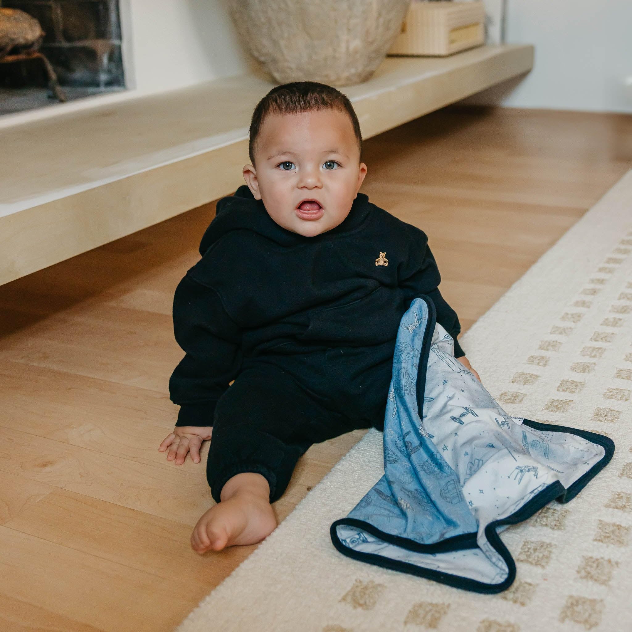 Copper Pearl travel-ready blanket fits diaper bag or stroller.