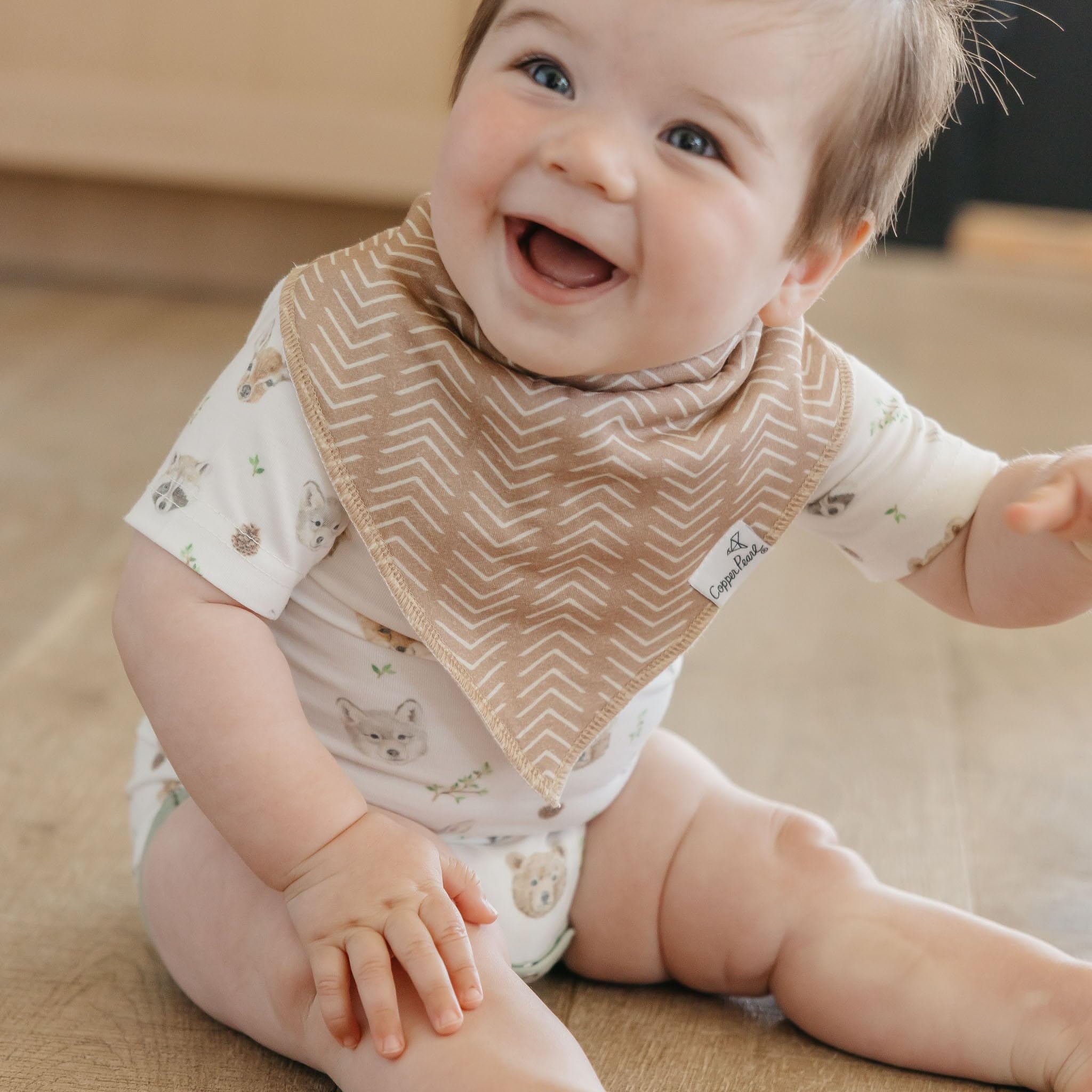 Copper Pearl Wilder bandana bib set on baby shows versatile fashion-forward accessory
