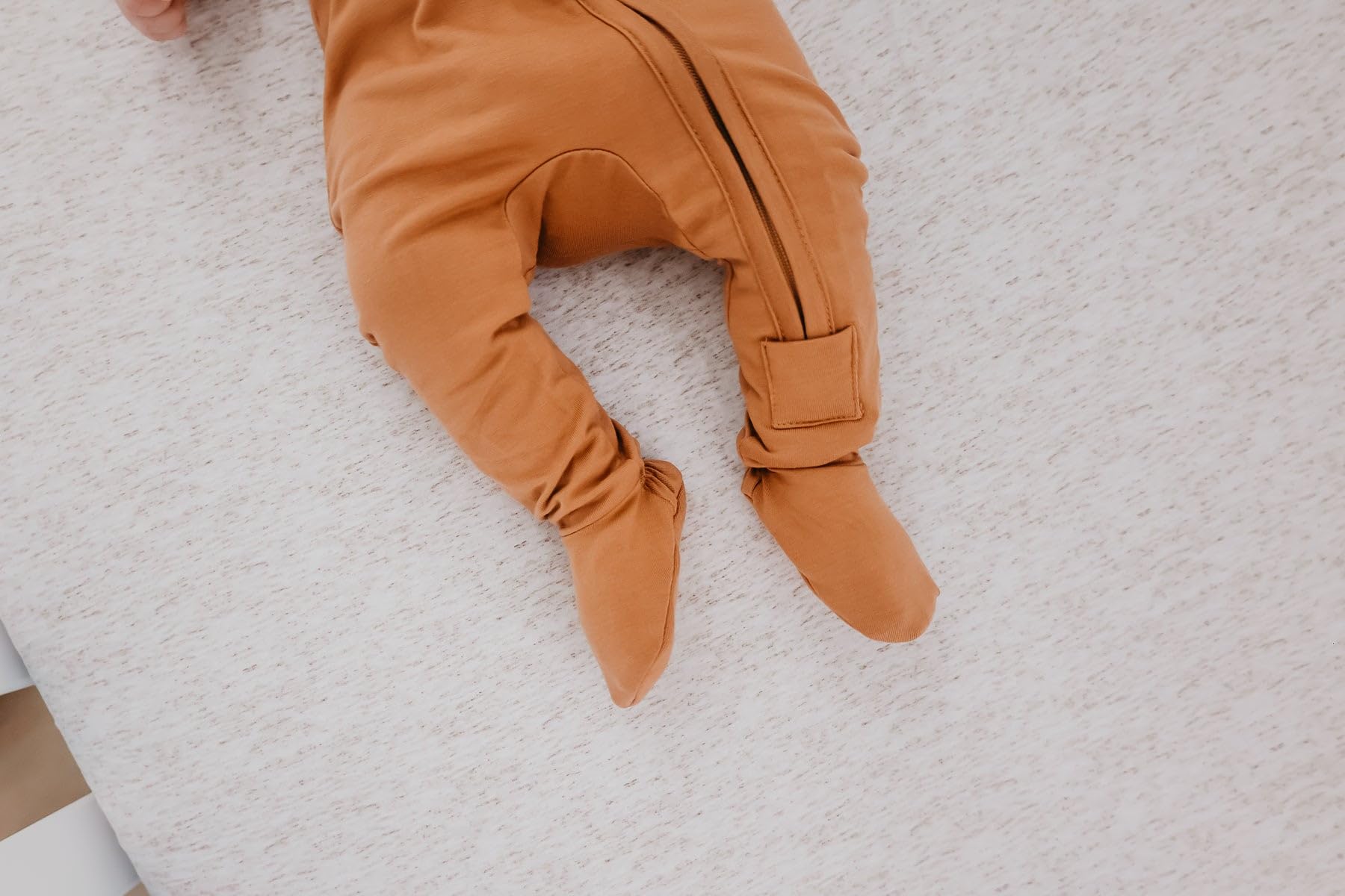 Copper Pearl zip-up footie pajama pecan color adds timeless warmth.