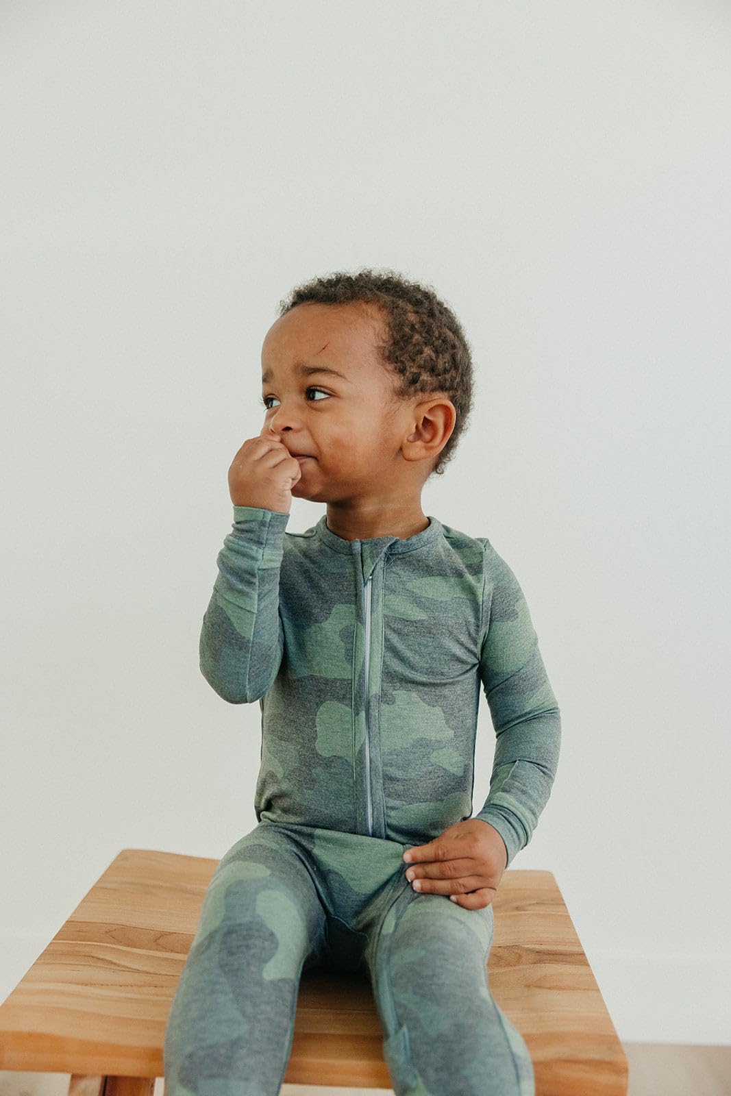 Copper Pearl Zip-Up Footie Pajamas Hunter, fabric texture, buttery-soft knit for cozy snuggles.