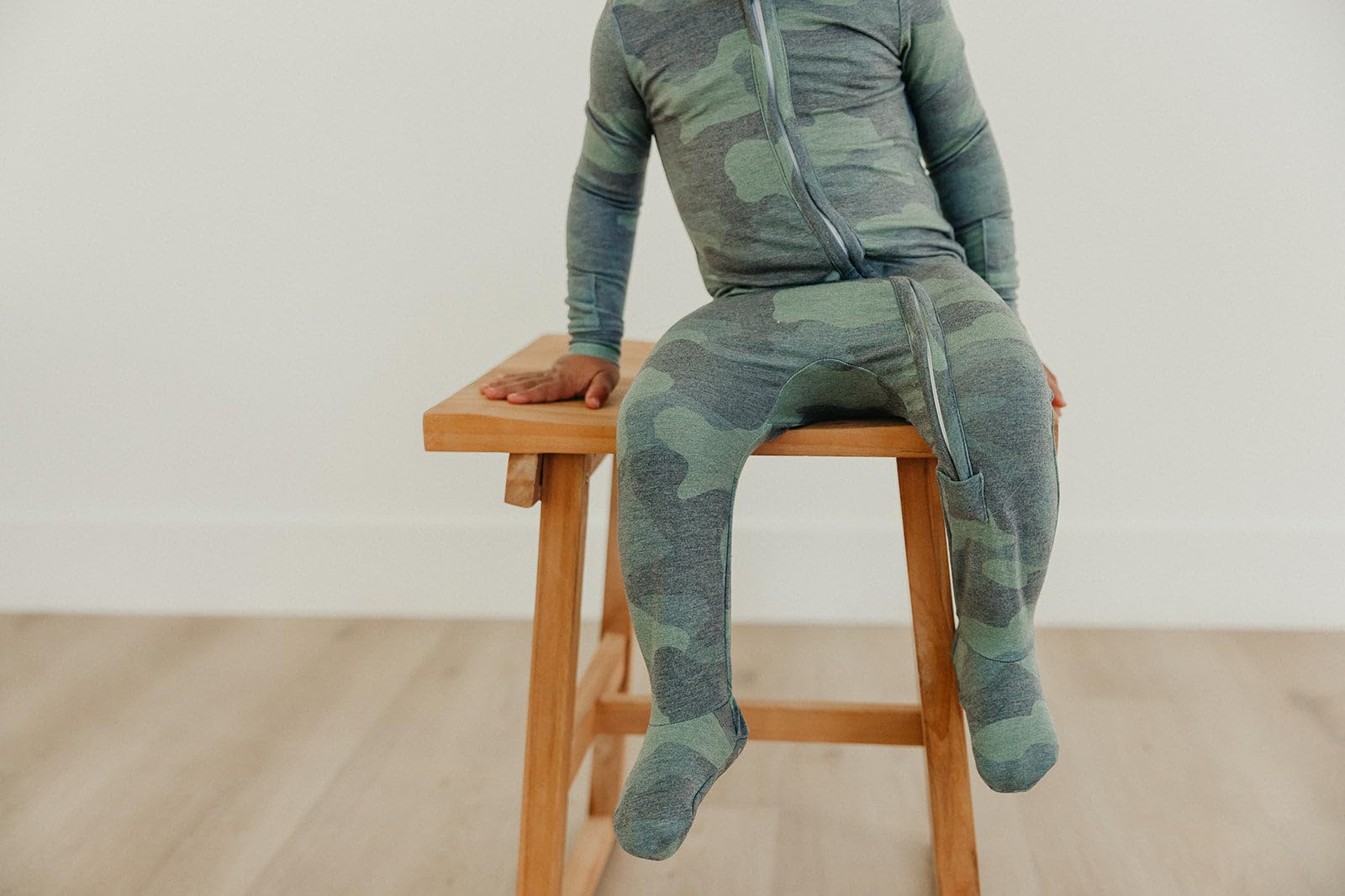 Copper Pearl Zip-Up Footie Pajamas Hunter, ideal sleepwear and lounge layering for babies.