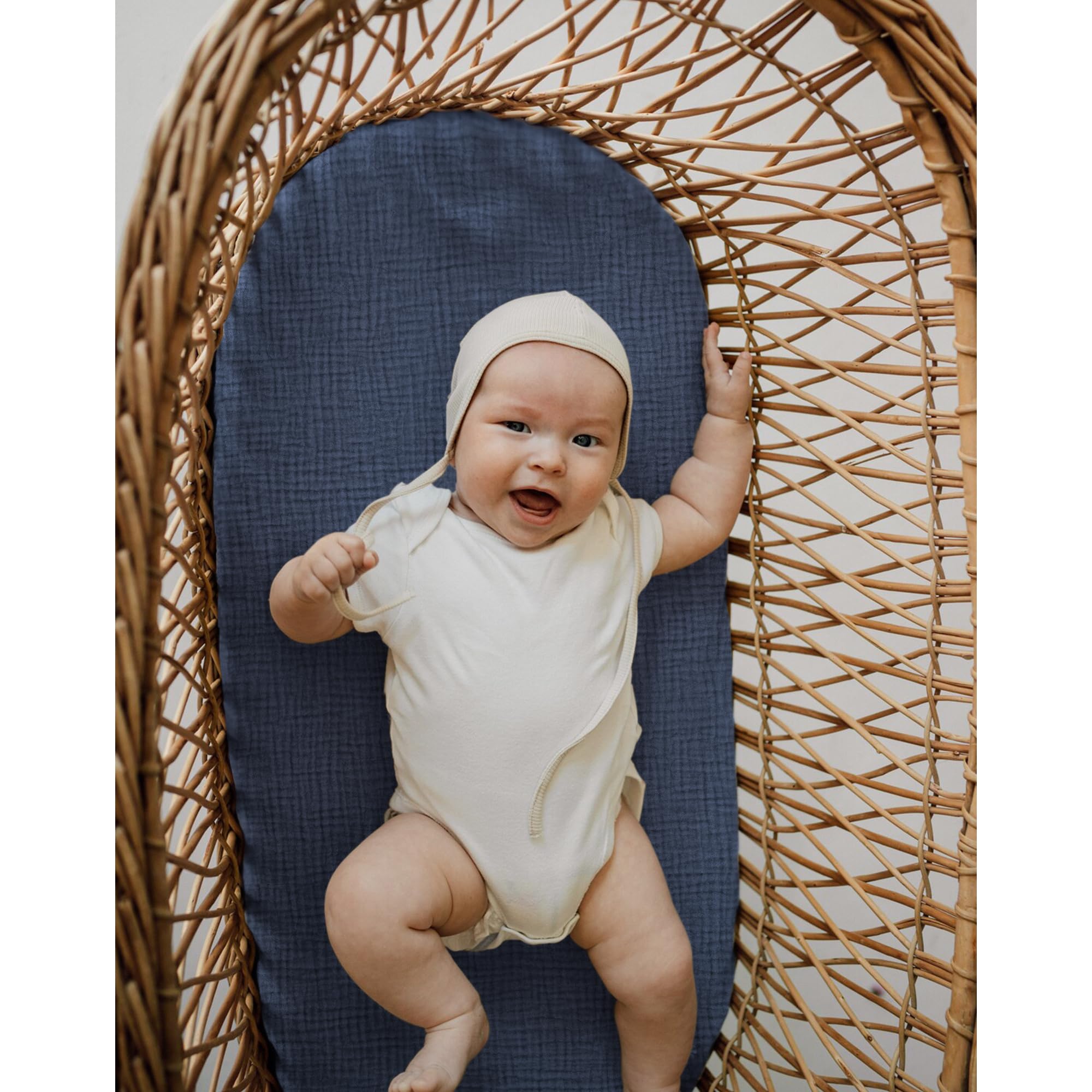 Coreeky baby sleeping scene with bassinet sheets enhancing comfort.