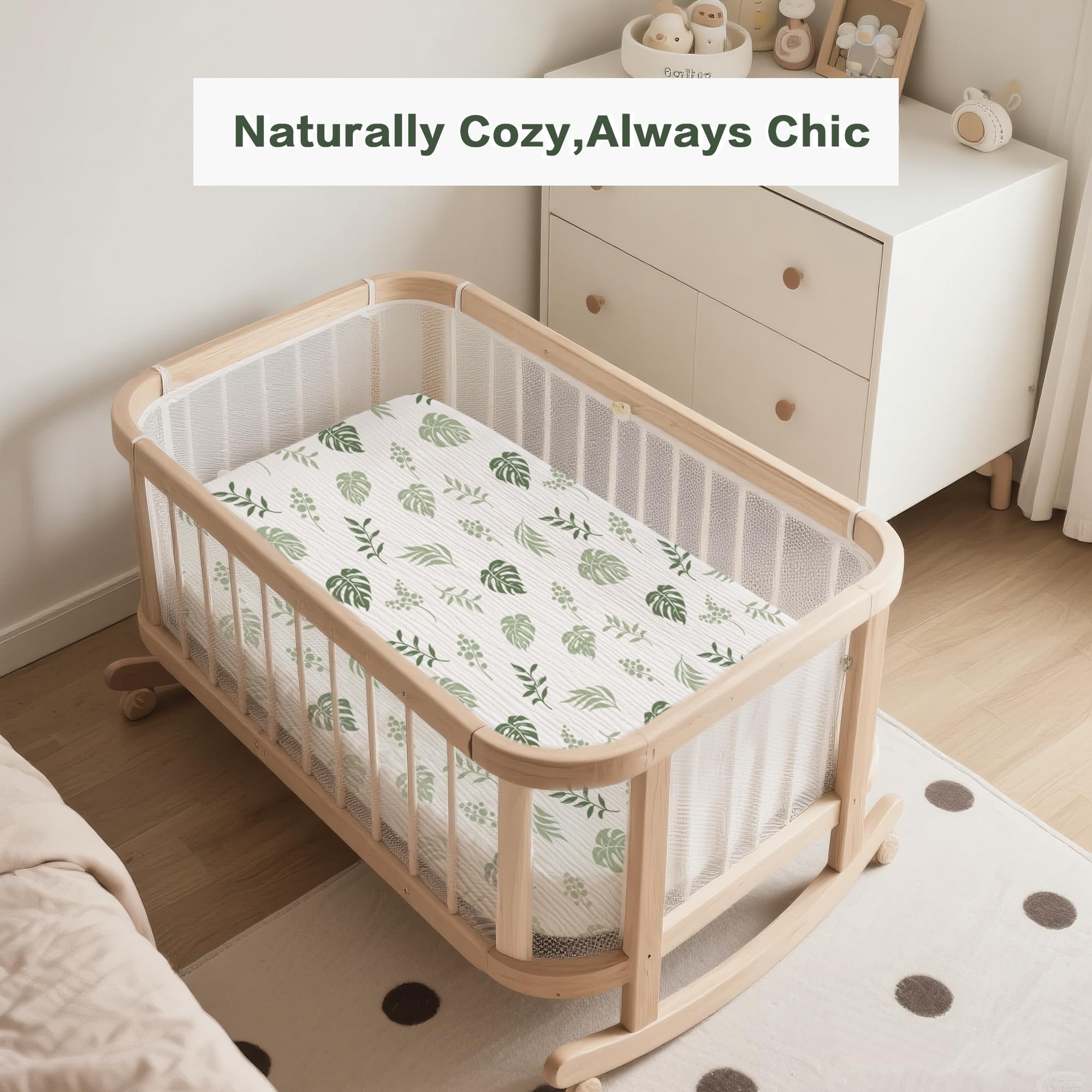 Coreeky leaf green muslin sheets on a bassinet showing soft fabric