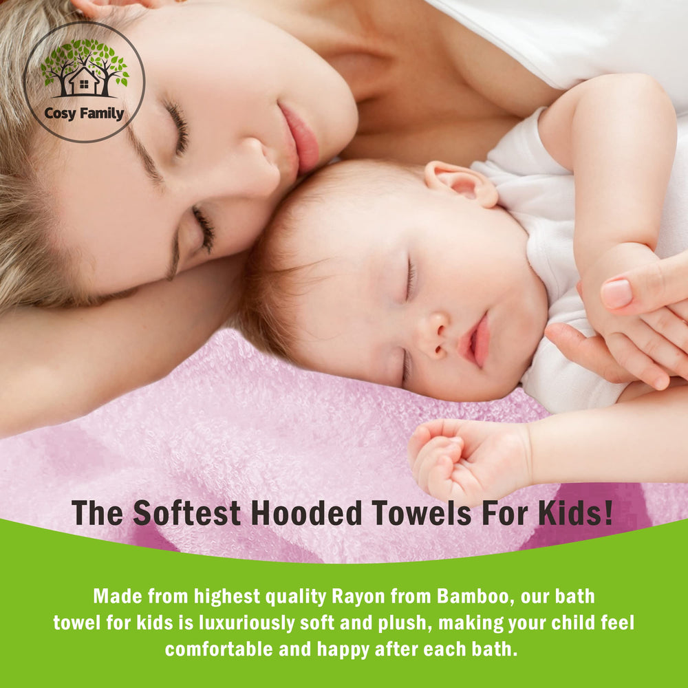 Baby wrapped in Cosy Family bamboo hooded towel after bath.
