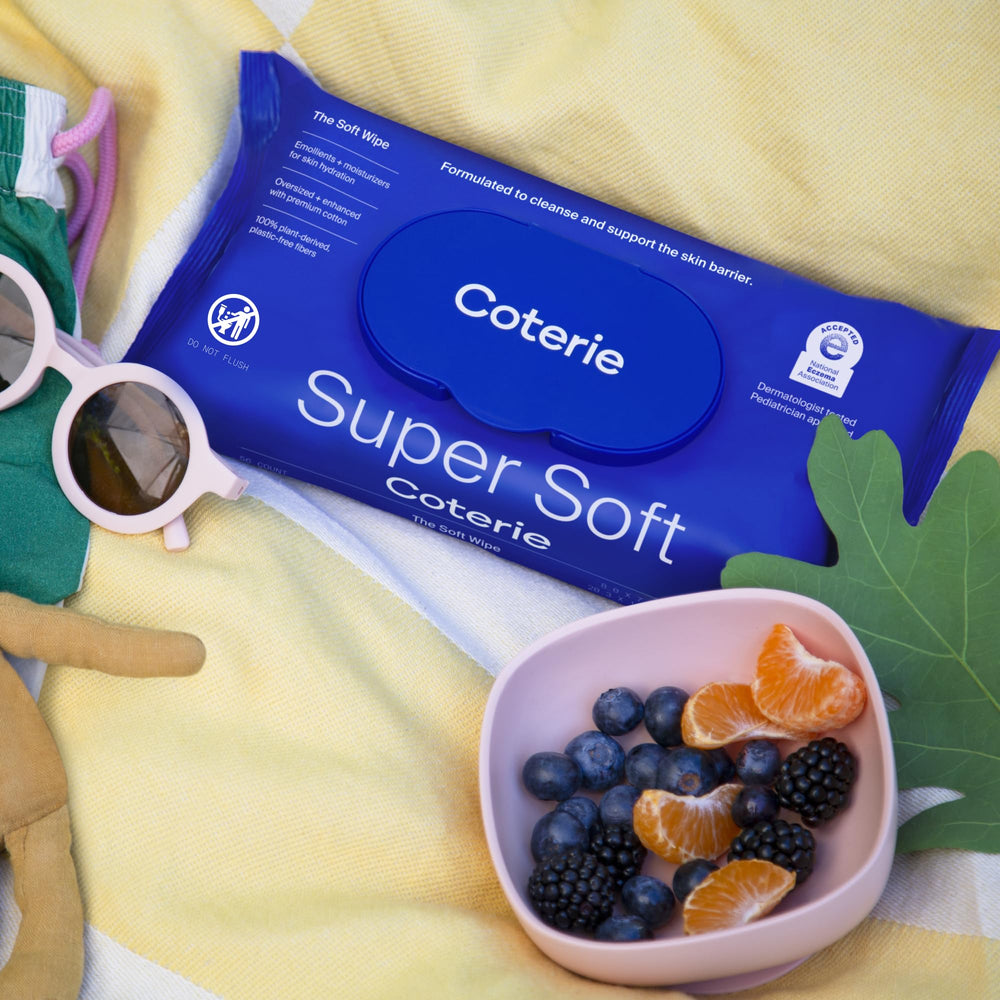 Diaper change scene with Coterie Baby Soft Wipes during mealtime cleanup