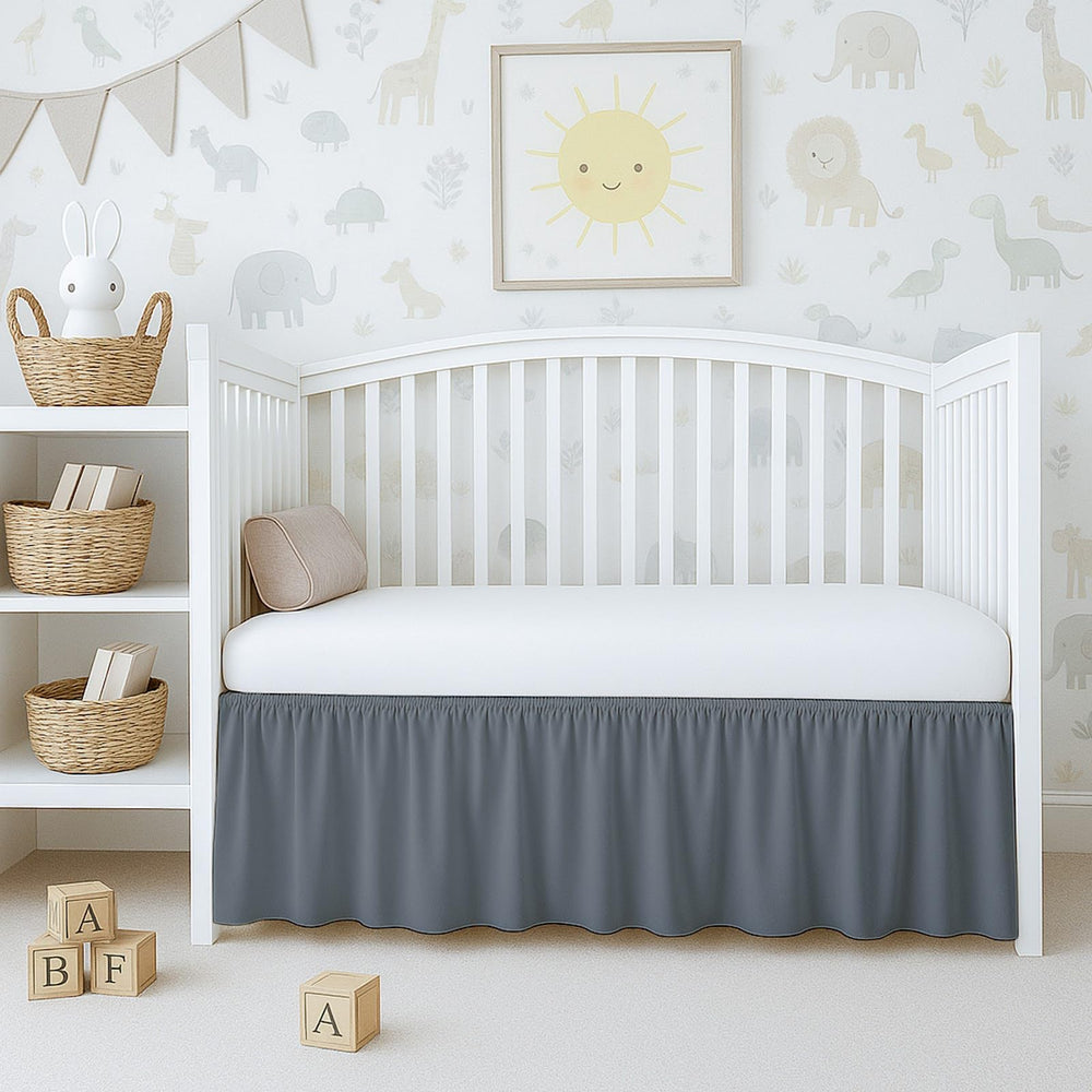 Cottington Lane dark grey crib skirt front view showing polished nursery look