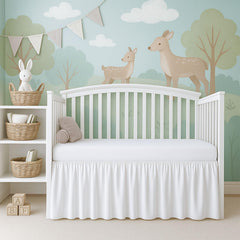 Cottington Lane ruffled crib skirt in white adds cozy texture to nursery cribs.