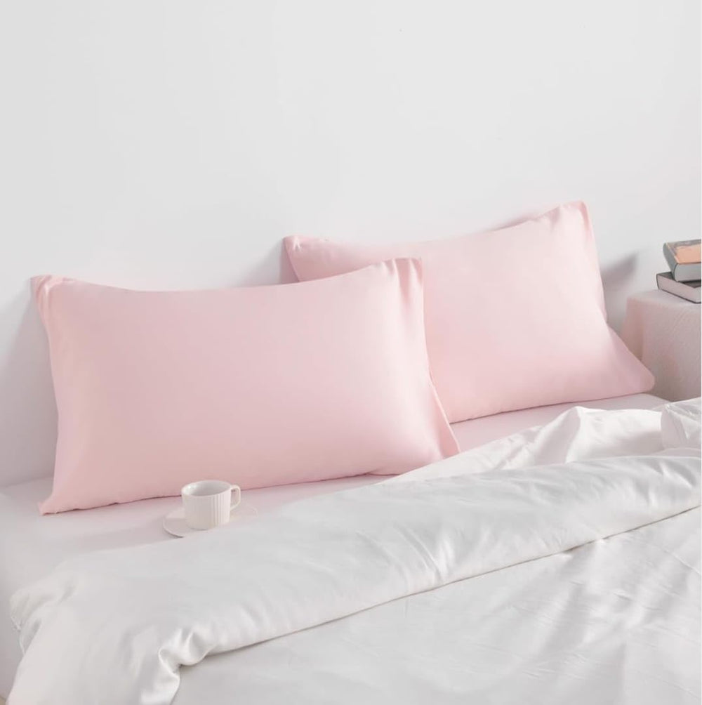 COTTON STICH two-pack toddler pillowcases offer practical, ready-to-use bedding.