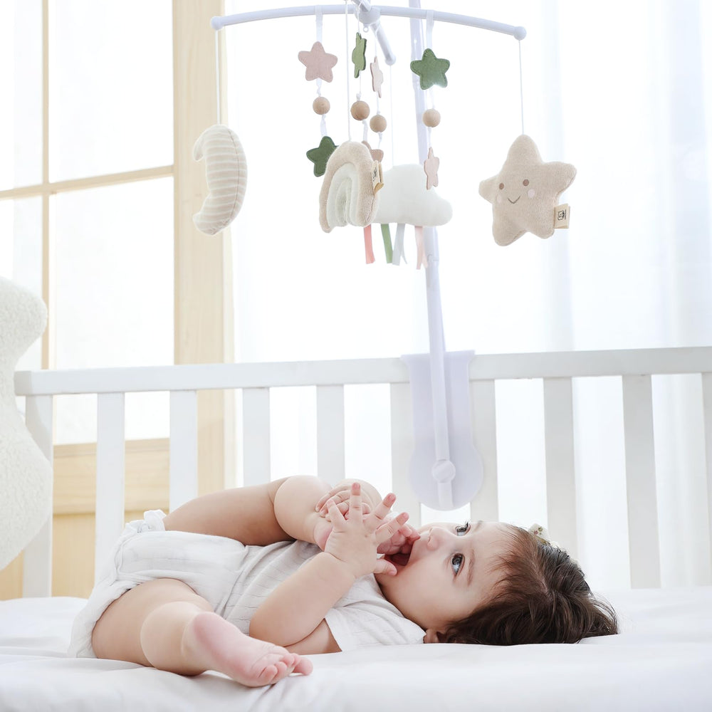 COTTONBEBE plush toys hanging securely for safe baby exploration.