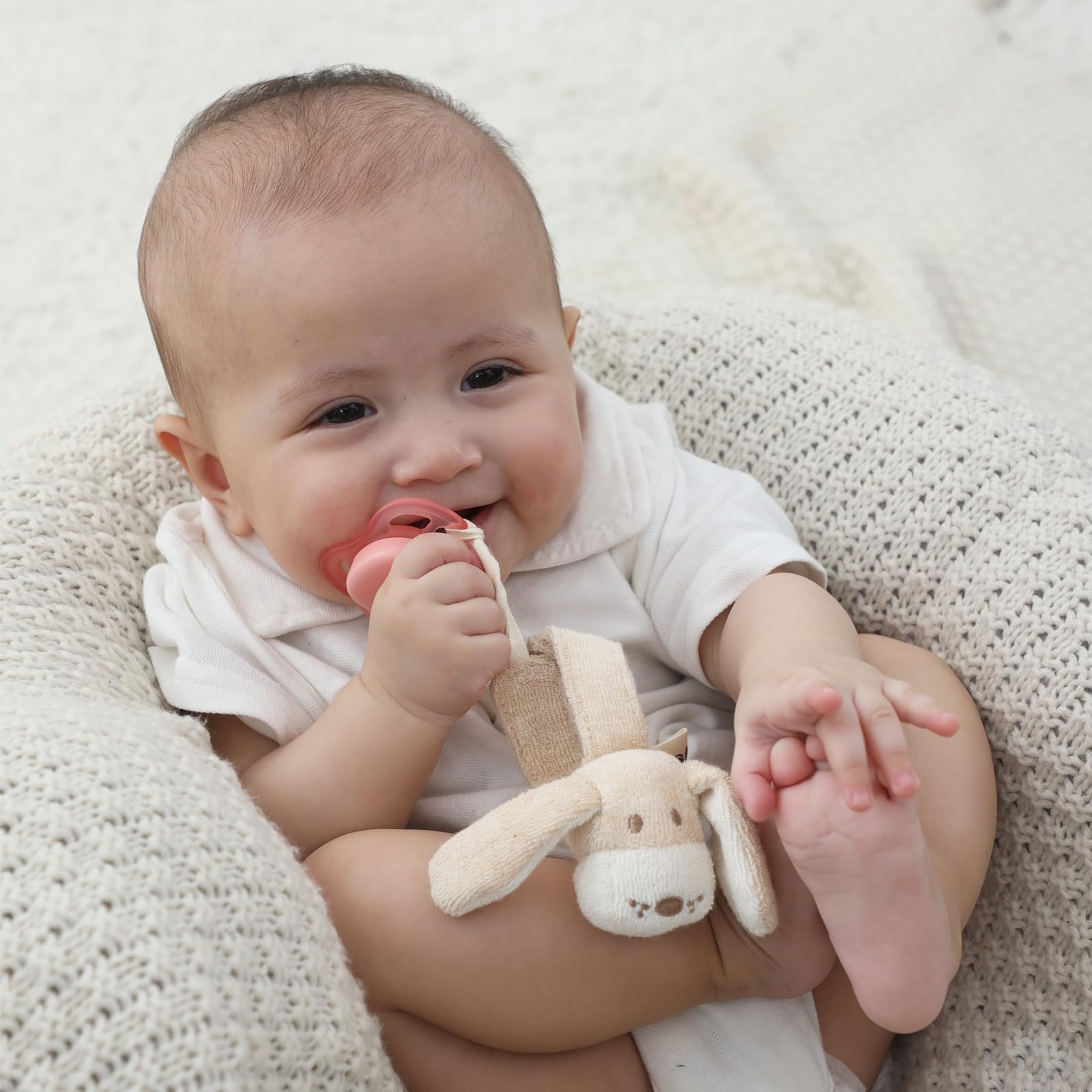 COTTONBEBE pacifier clip attaches to clothes for easy reach