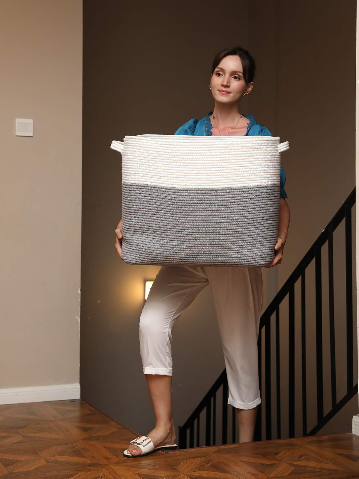 Cottonphant grey basket blends with neutral decor while concealing clutter.