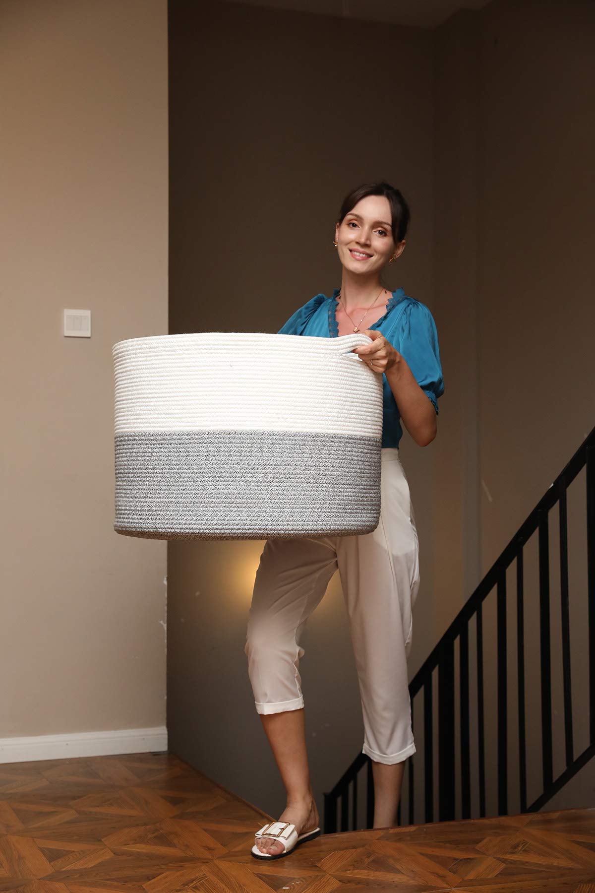 Cottonphant grey mix living room organization basket offers versatile storage with elegance.