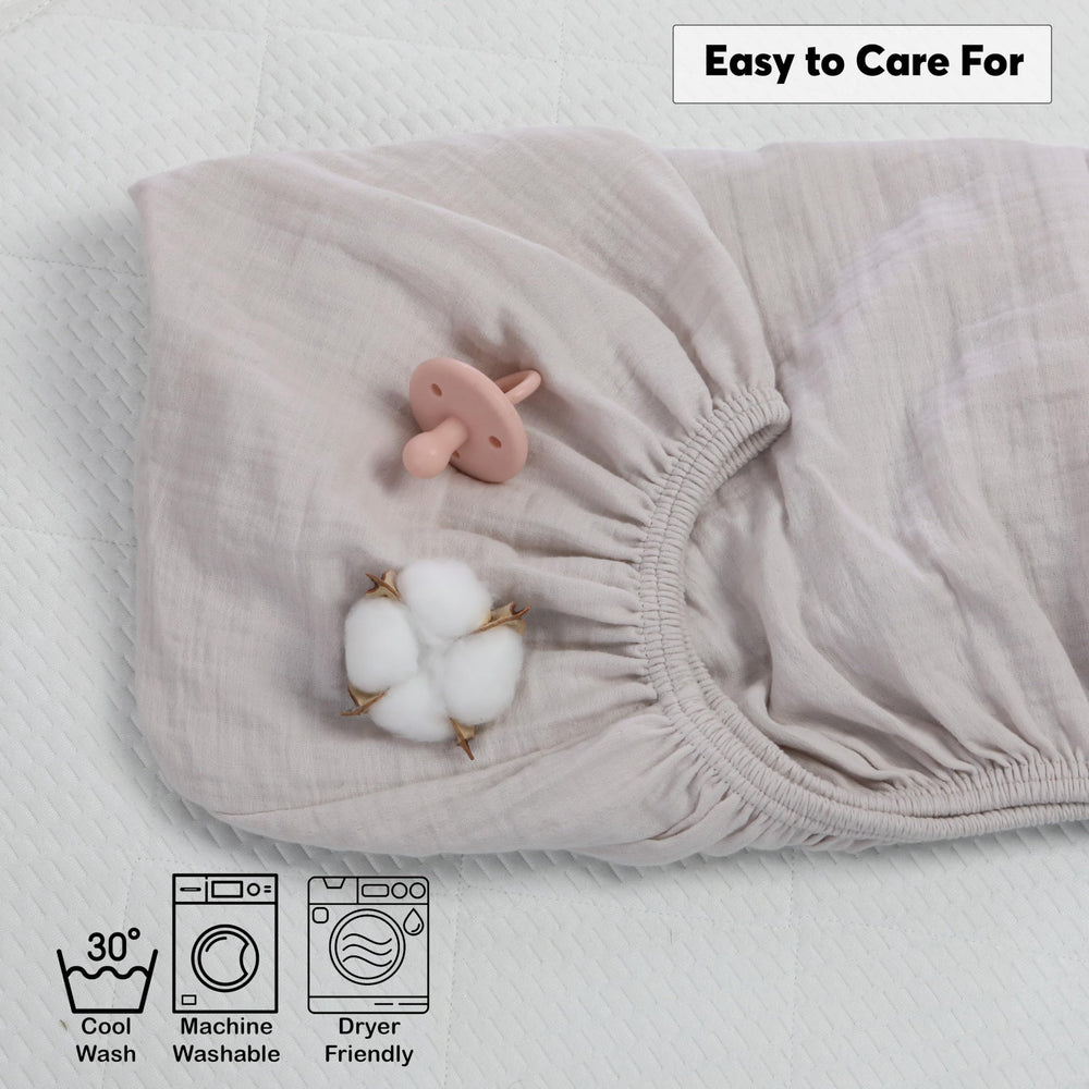 Cottonsis muslin crib sheet made in Türkiye on a cozy sleep surface.
