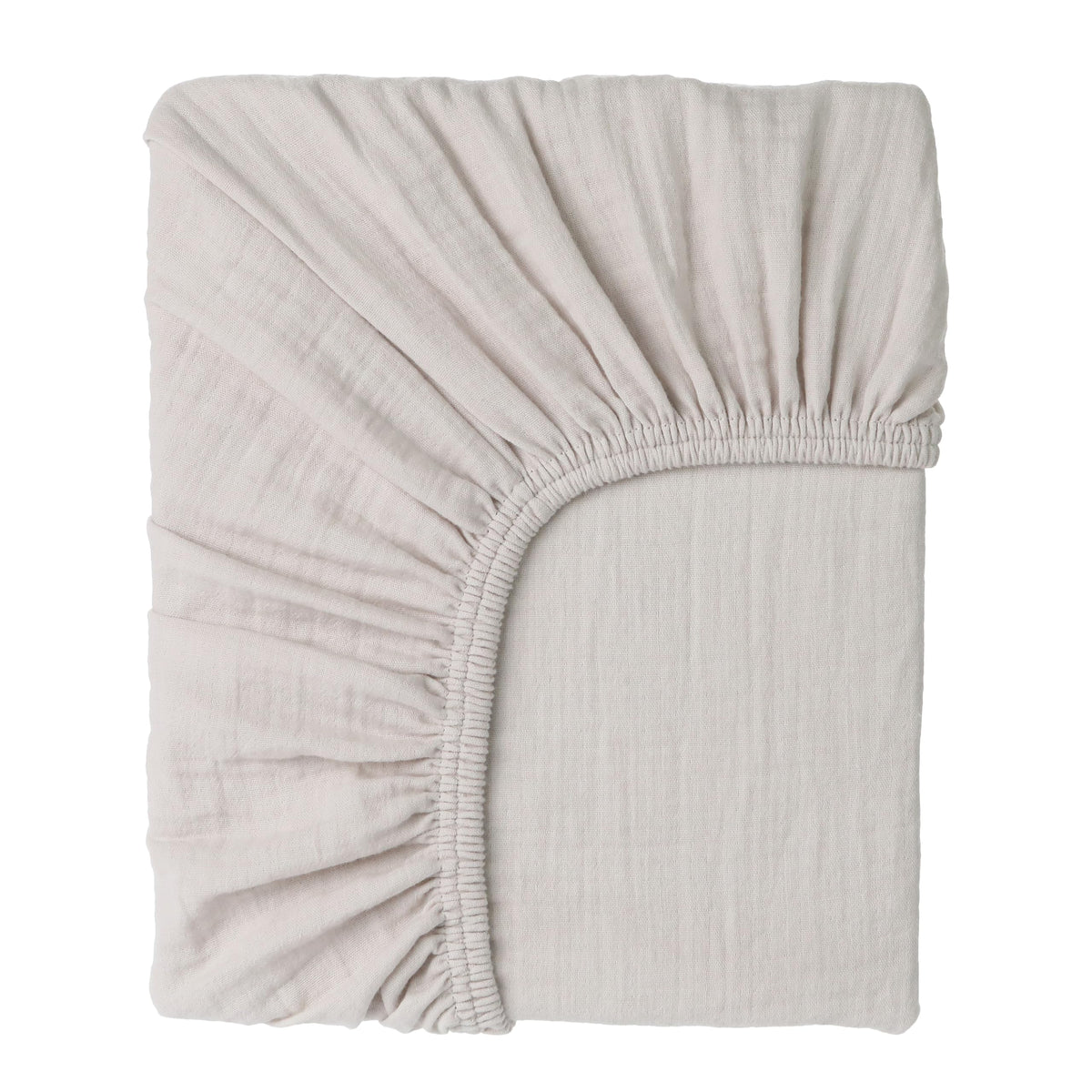 Cottonsis Muslin crib sheet close-up shows ultra-soft fabric for newborn comfort.