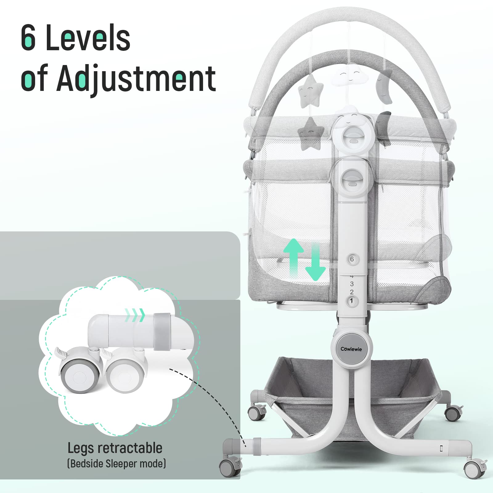 Cowiewie bassinet features black and white toys to entertain newborns.