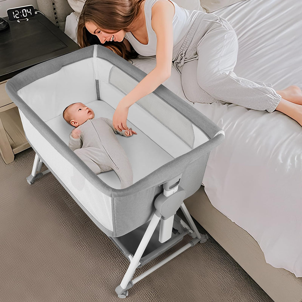 Cowiewie bassinet's pyramid base providing stable bedside setup for safe sleep.