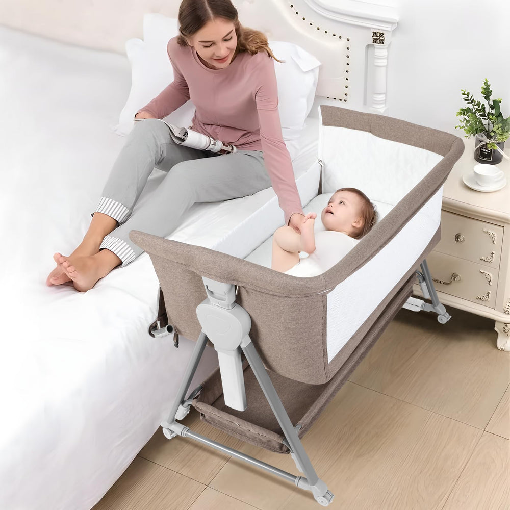 Cowiewie bassinet with pyramid base offers stable nighttime sleep support.