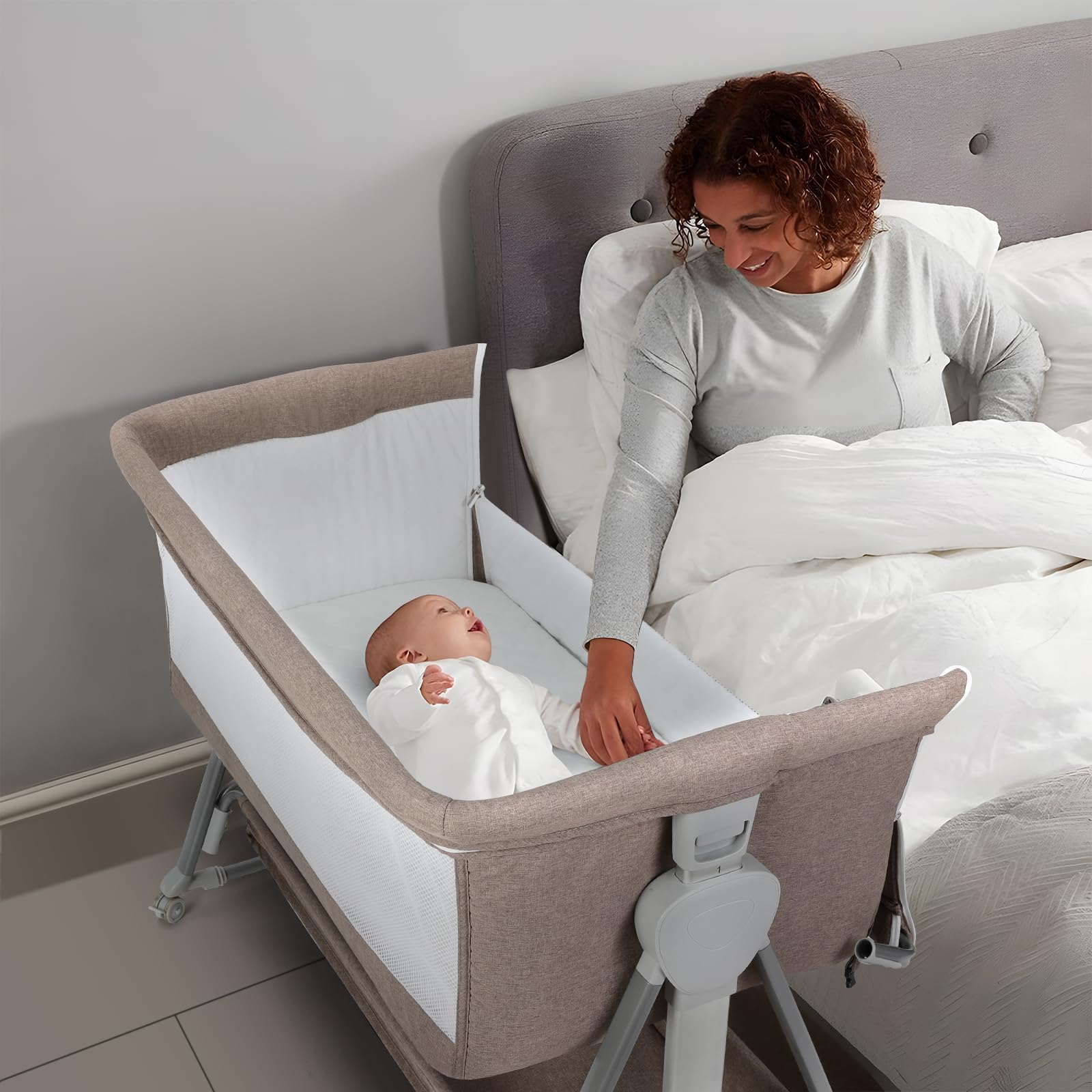 Large storage basket on Cowiewie bassinet keeps diapers within reach.