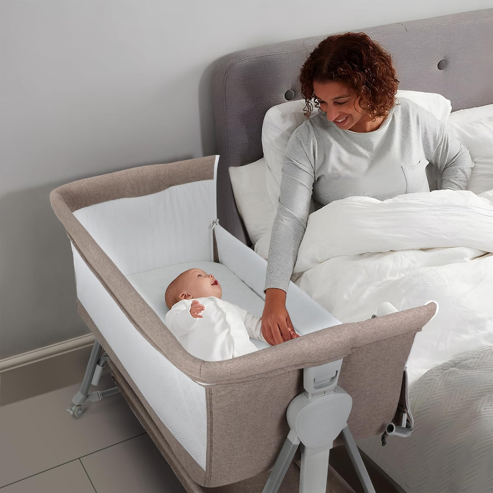Large storage basket on Cowiewie bassinet keeps diapers within reach.