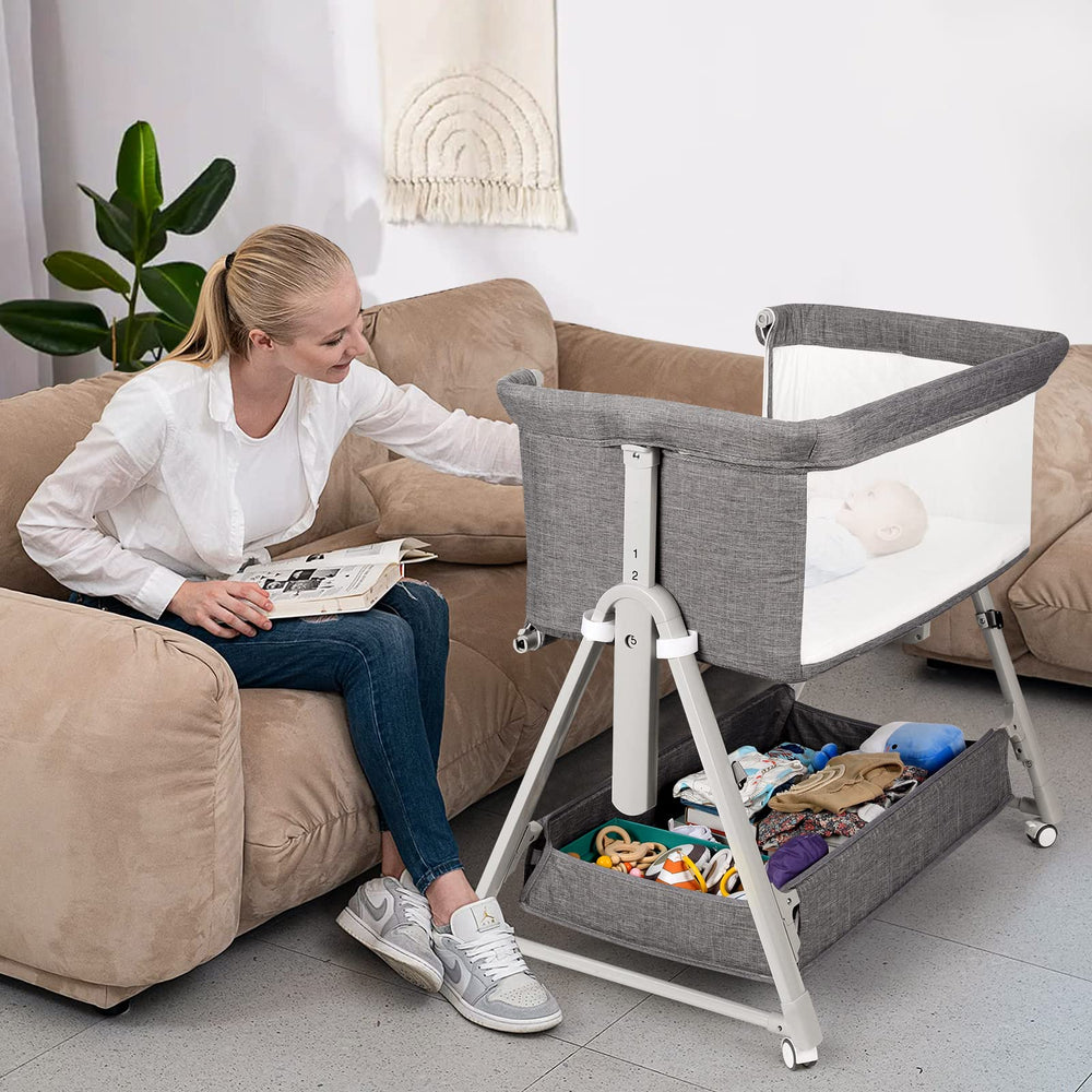 Cowiewie Bassinet Bedside Sleeper XL storage basket keeps wipes and diapers at hand.