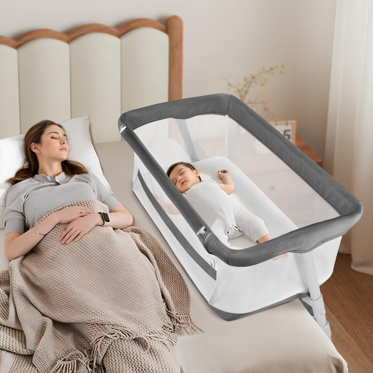 Cowiewie bassinet beside bed with secure attachment for nighttime care.