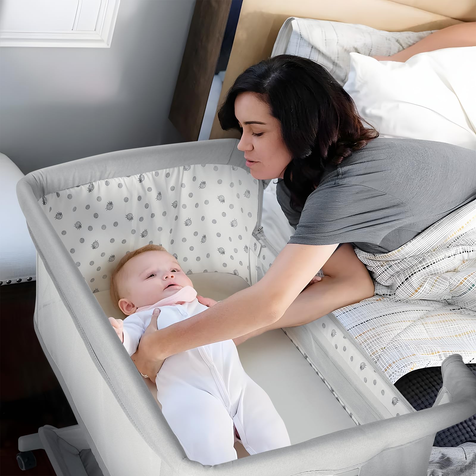 Cowiewie Bassinet incline function supports comfortable feeding positions.