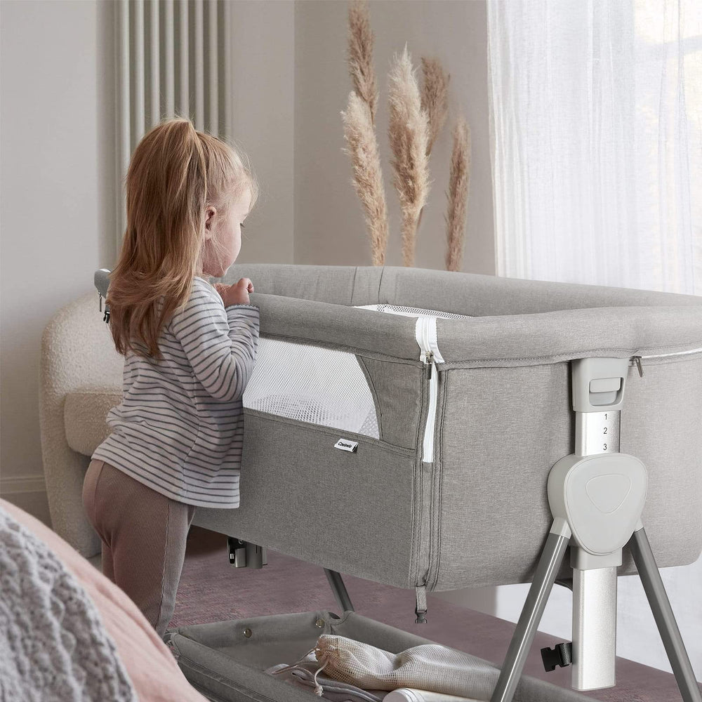 Side-access zipper on the Cowiewie bassinet enables easy nighttime feeding.